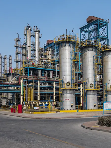 Chemical processing facility with industrial storage vessels and piping