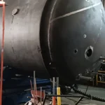 Cryogenic tank materials including stainless steel inner vessels and insulated outer shells